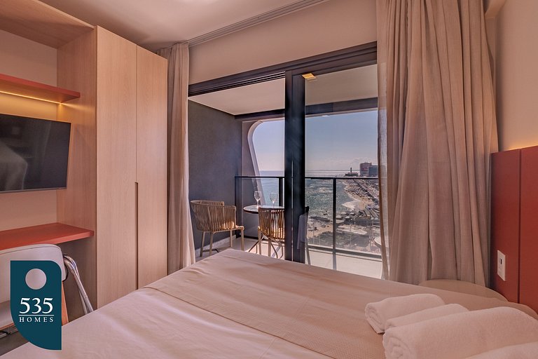 Visite a orla da Barra com vista ampla para o mar